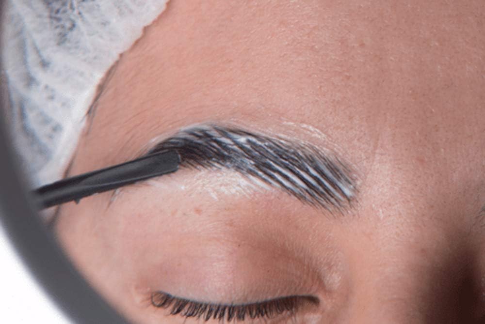 J Denis before-after eyebrows frame shows lifted, defined look.