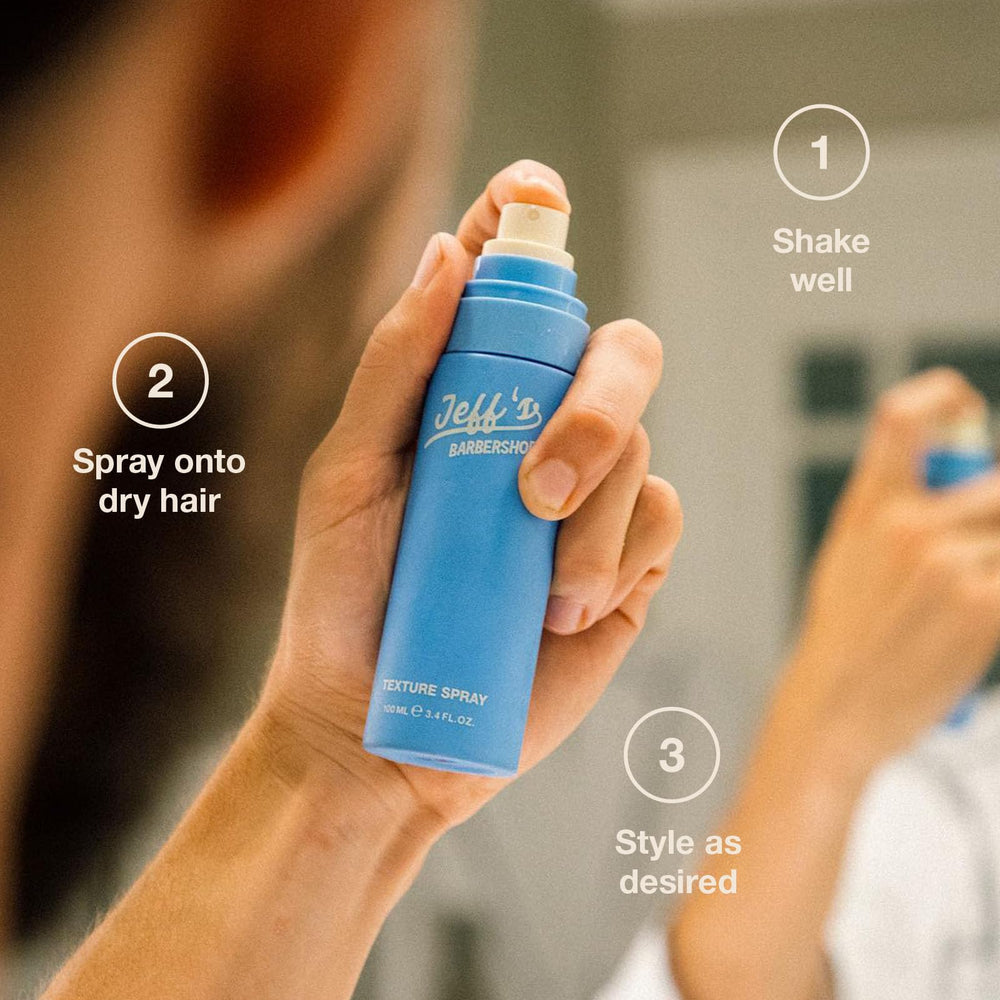 Jeff's Barbershop Sea Salt Texture Spray application hand mist demonstrates easy, even distribution for full-bodied style.