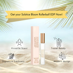 Jennifer Aniston Solstice Bloom rollerball on hand with warm glow.