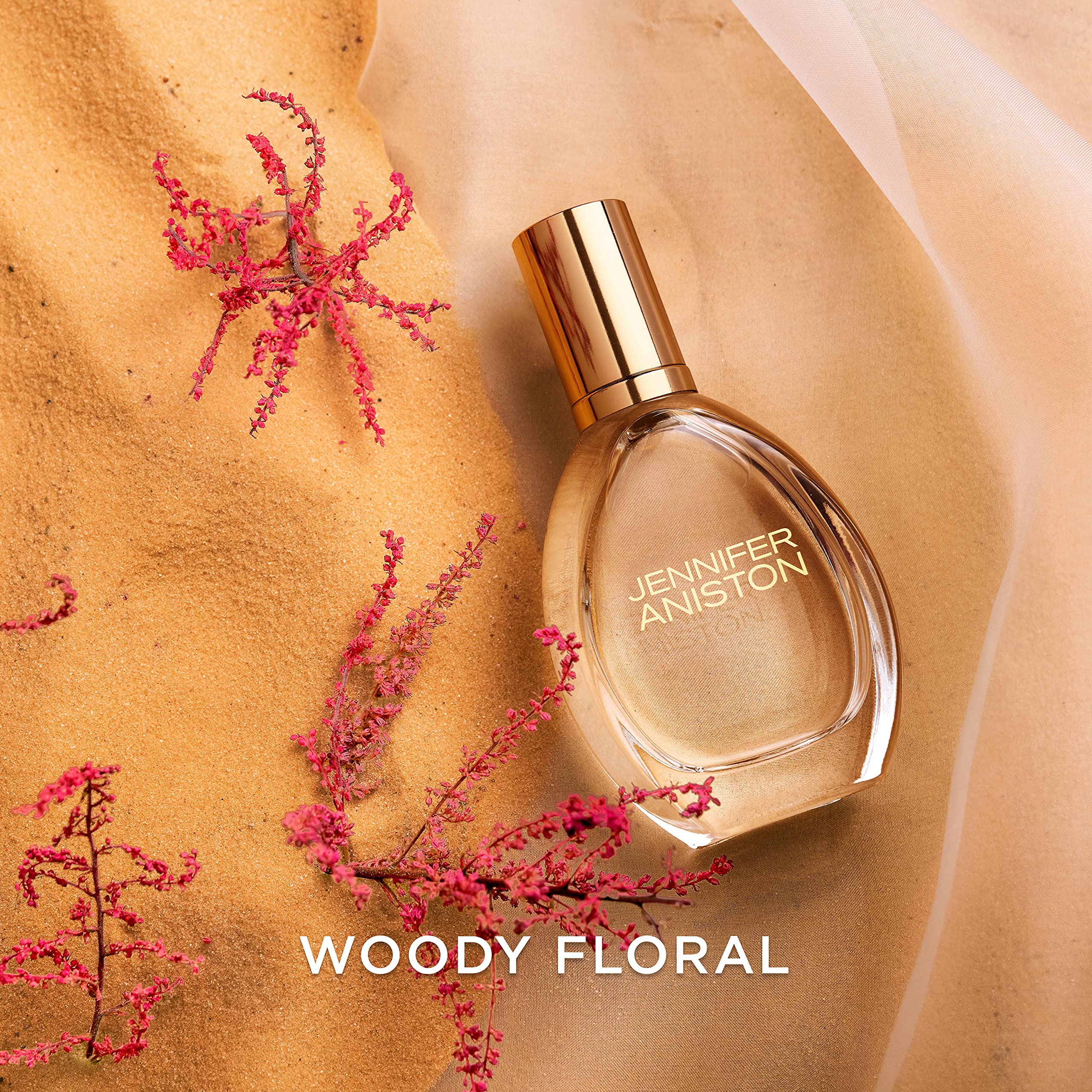 Jennifer Aniston Solstice Bloom warm woods note trail evokes sunlit warmth.