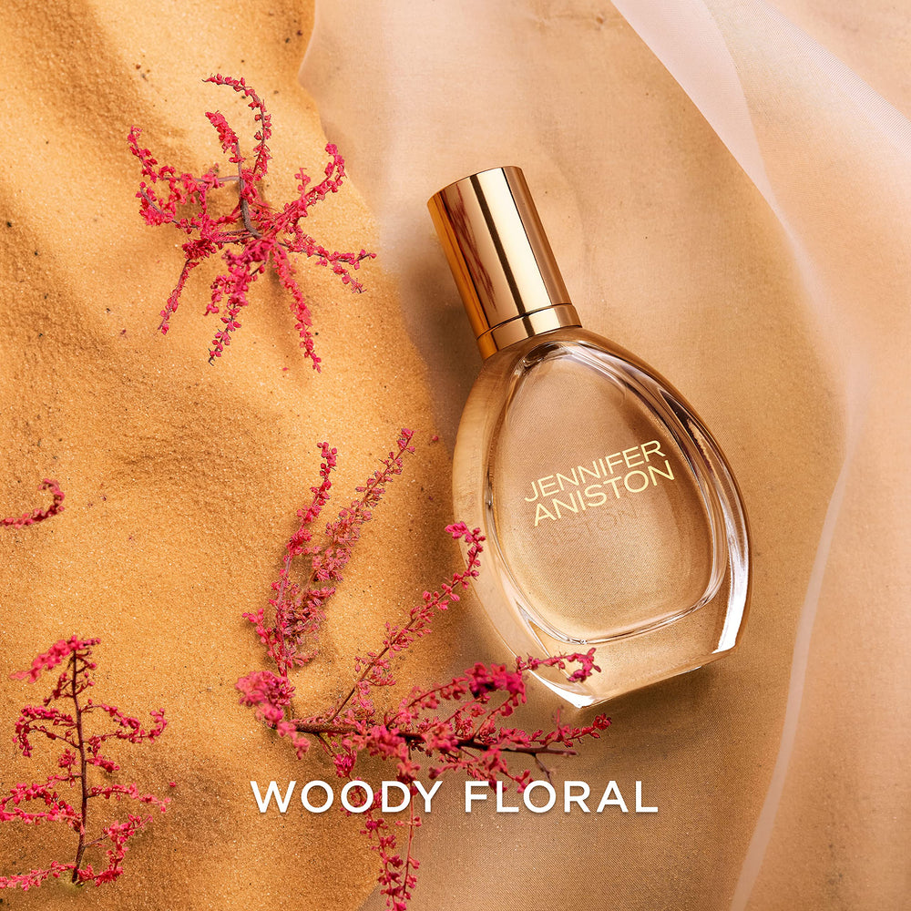 Jennifer Aniston Solstice Bloom warm woods note trail evokes sunlit warmth.