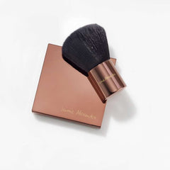 Jerome Alexander Magic Minerals baked bronzer color swirl application demonstrates self-adjusting shade match.