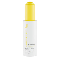 Jess Beauty Face Sunscreen Sun Drops bottle shows lightweight SPF 50 oil for daily protection.