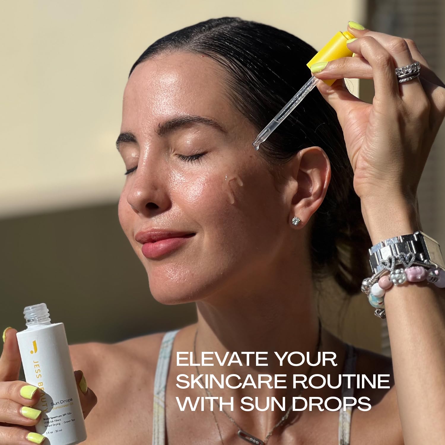 Packaging highlights travel-friendly 1 fl oz bottle from Jess Beauty Sun Drops.
