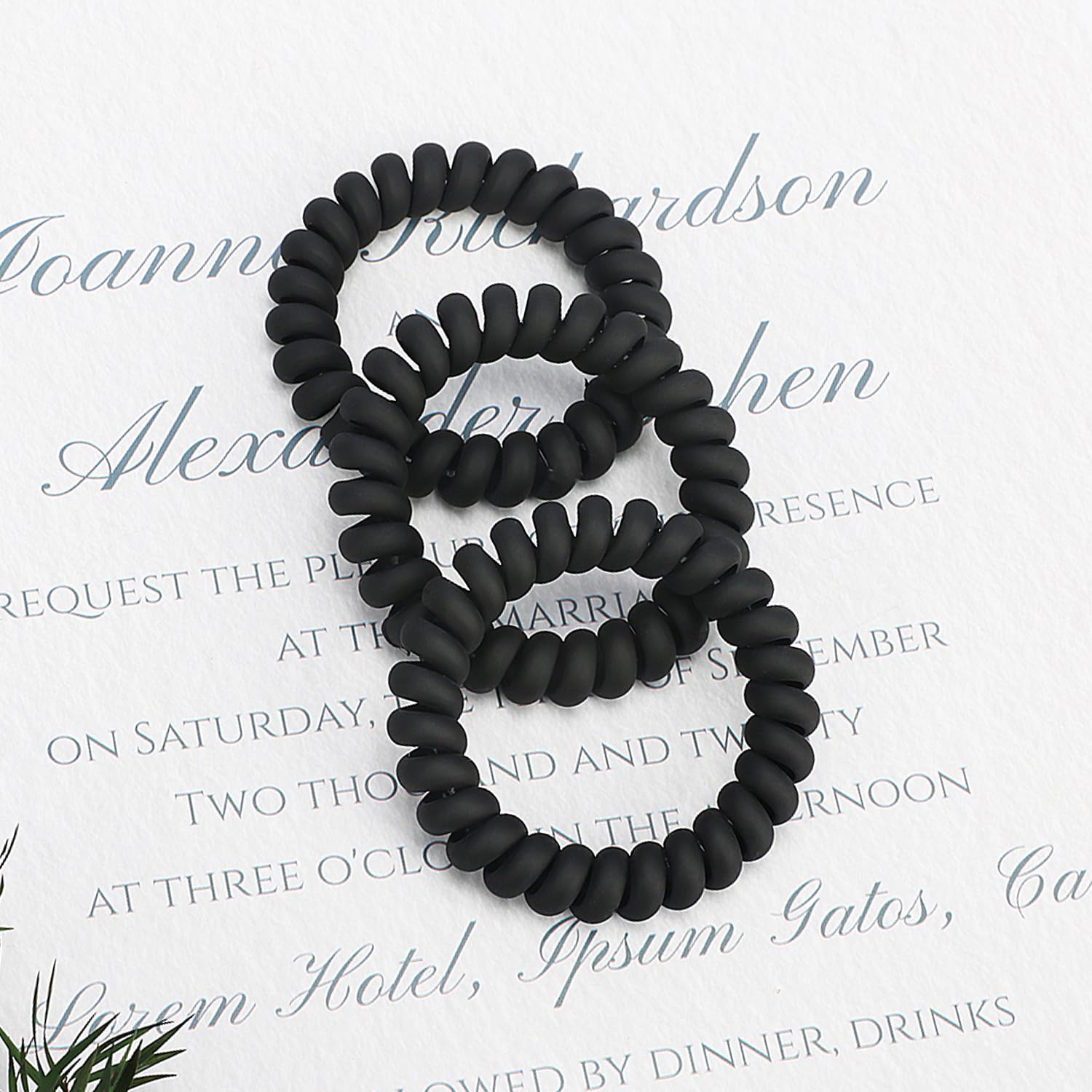 JessLab spiral hair ties worn as bracelet demonstrating fashion-friendly, ready-to-use accessory