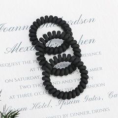 JessLab spiral hair ties worn as bracelet demonstrating fashion-friendly, ready-to-use accessory