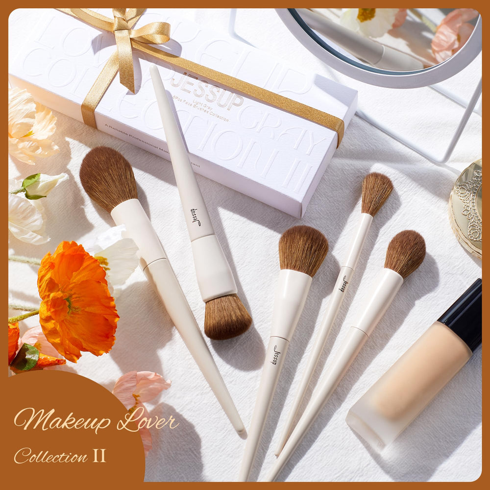 Jessup brush set close-up on light-grey handle for grip.