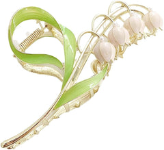 Jinshining pink lily valley flower clip closeup, adding elegant detail to everyday hairstyles.