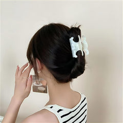 JITUIHOM butterfly clip in shell white adds elegant touch to hair