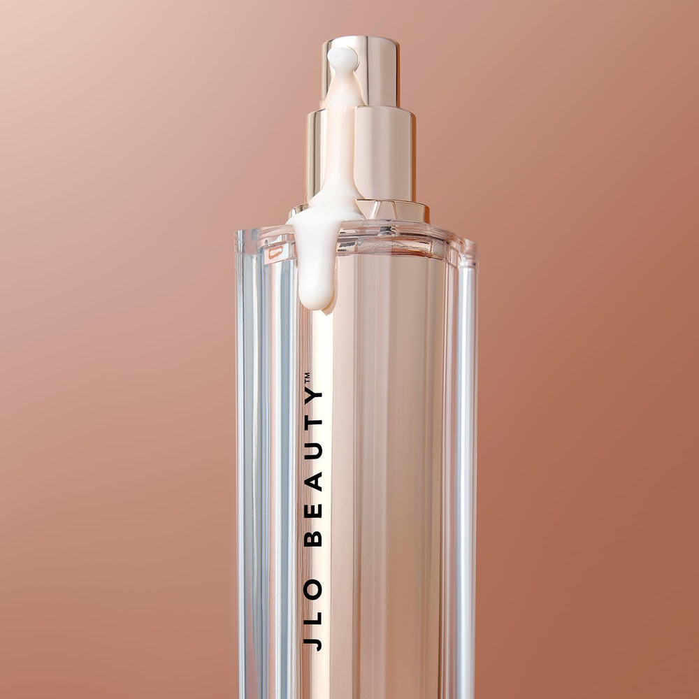 JLO BEAUTY Brightening Serum elegant jar closeup signals premium skincare ritual