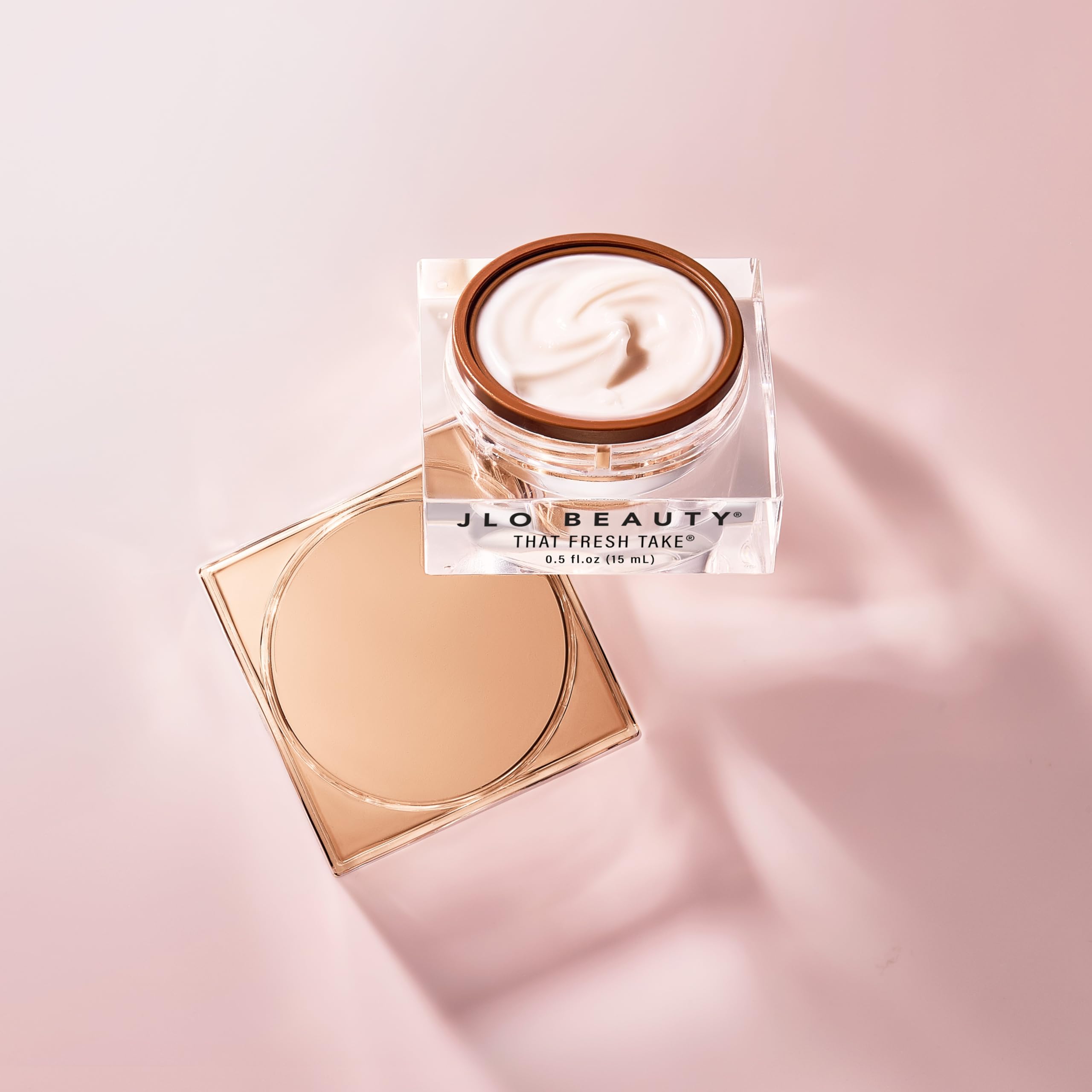 JLO BEAUTY ingredients: peptides and hyaluronic acid label detail for hydration-focused care.