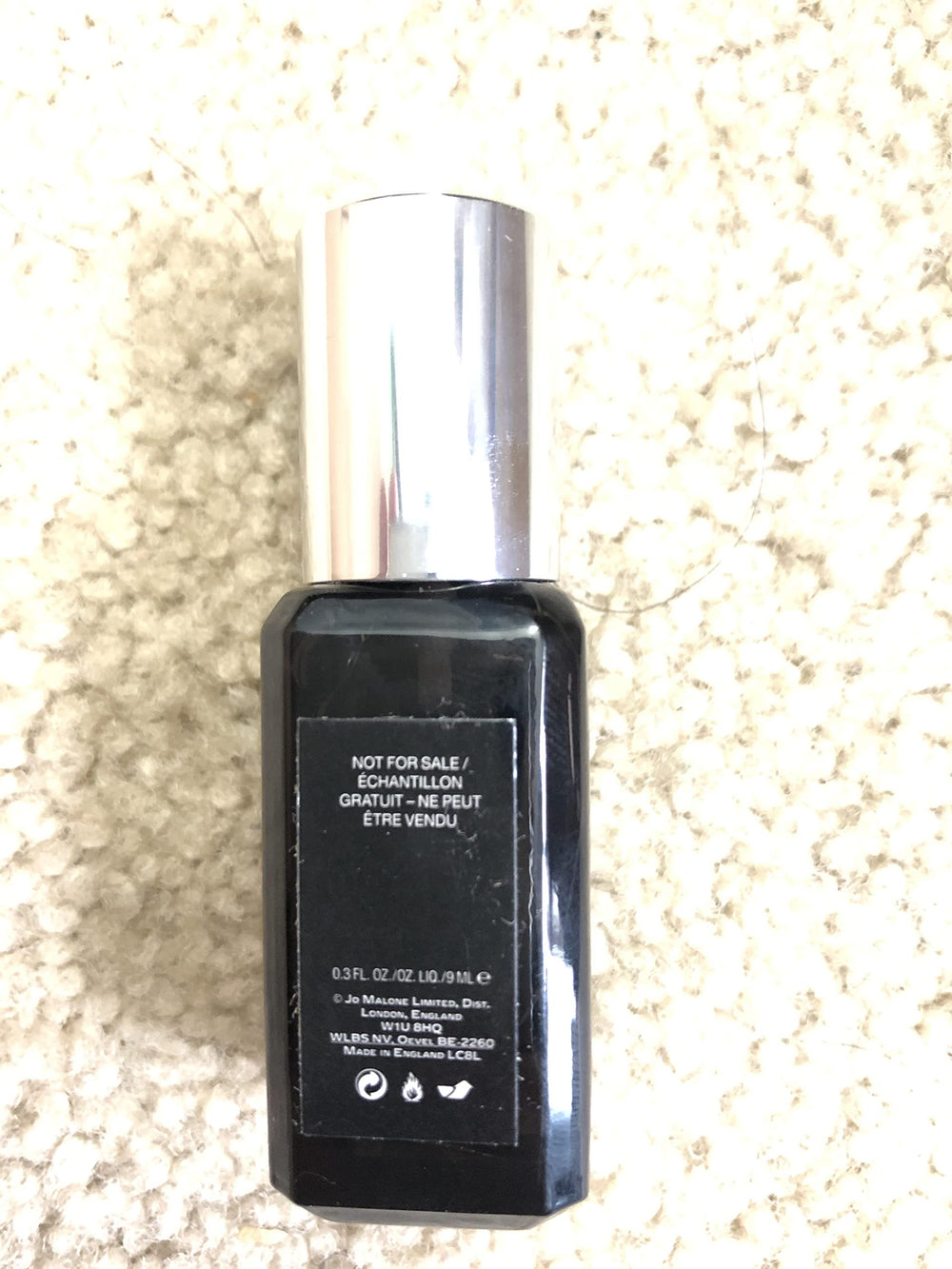 Lifestyle scene with Jo Malone Cypress & Grapevine—refined fragrance moment.