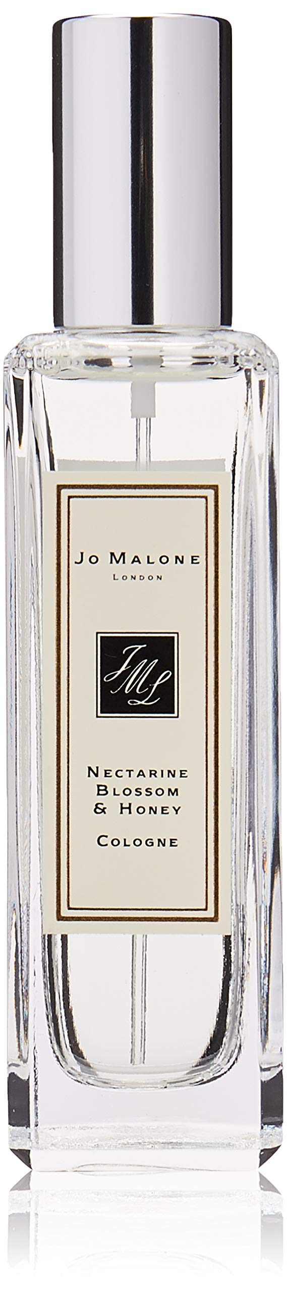 Jo Malone Nectarine Blossom & Honey bottle on a vanity for daytime elegance.