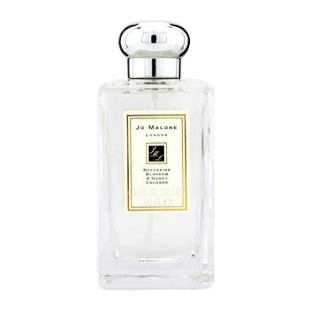 Jo Malone Nectarine Blossom & Honey cap-closeup highlights refined packaging
