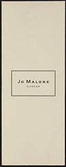 Close-up of Jo Malone Nectarine Blossom & Honey cap and bottle for premium packaging.