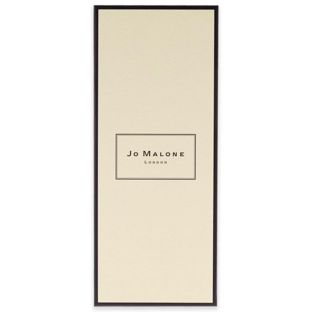Jo Malone Peony & Blush Suede bottle in hand suggests easy, elegant spritz use.
