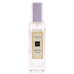 Jo Malone Peony & Blush Suede cap closeup highlights luxurious suede notes.