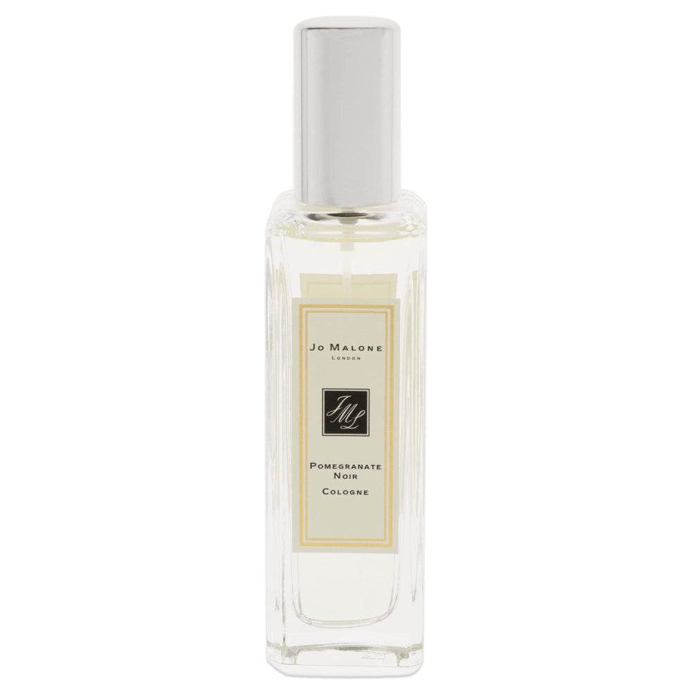 Jo Malone Pomegranate Noir cap close-up, suggests easy application and refined evening scent.