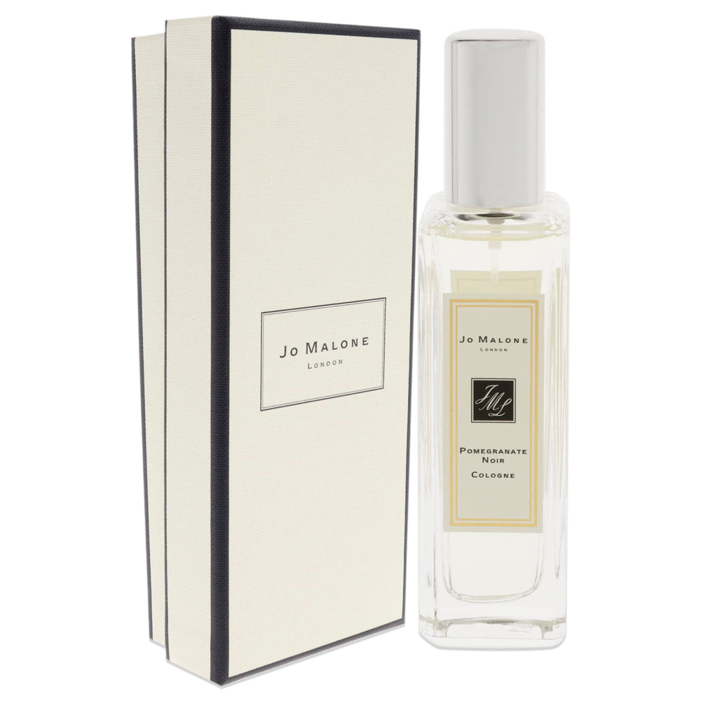 Jo Malone Pomegranate Noir spray application, convenient travel-size bottle for on-the-go refreshment.