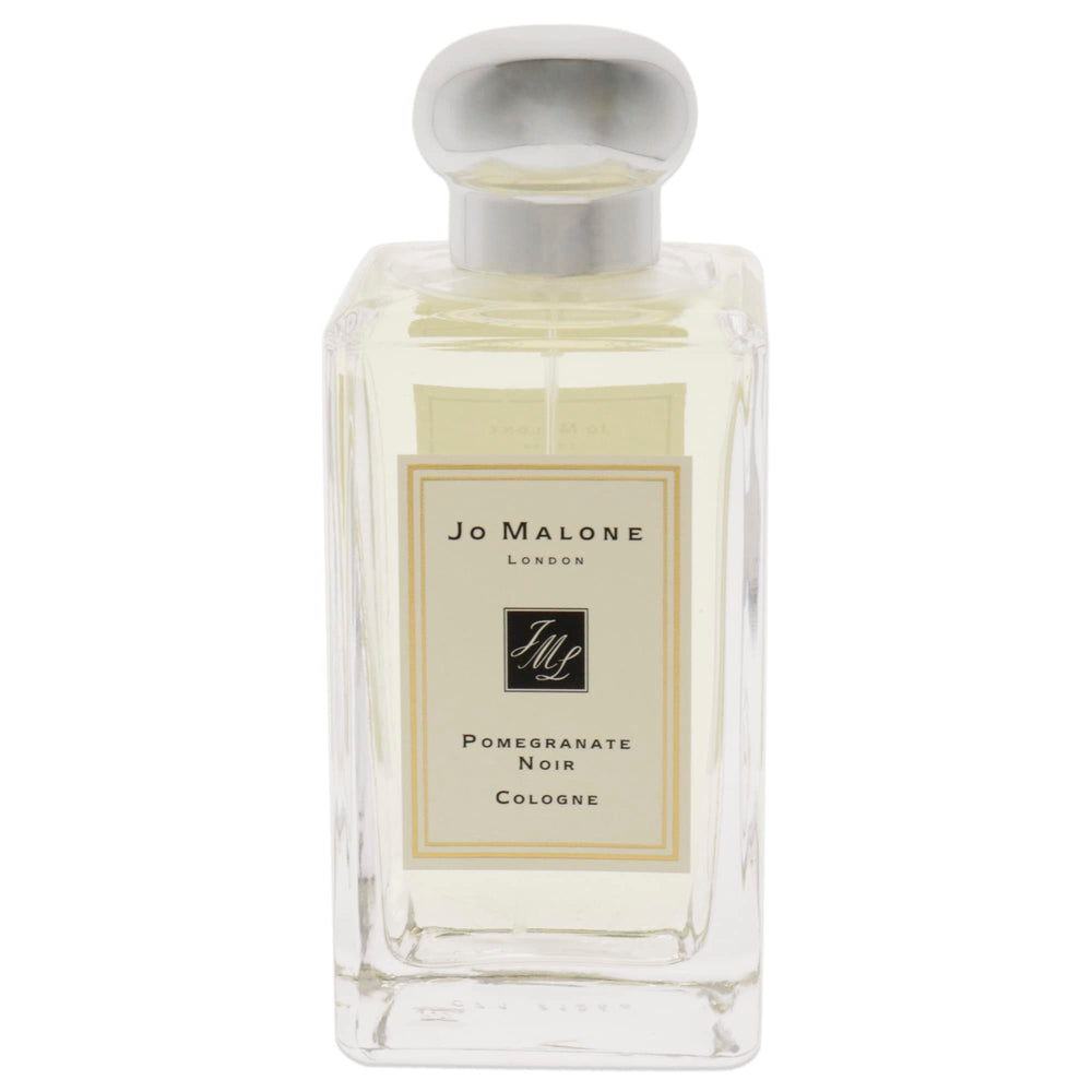 Jo Malone Pomegranate Noir spray demonstrates precise application for occasion-ready scent