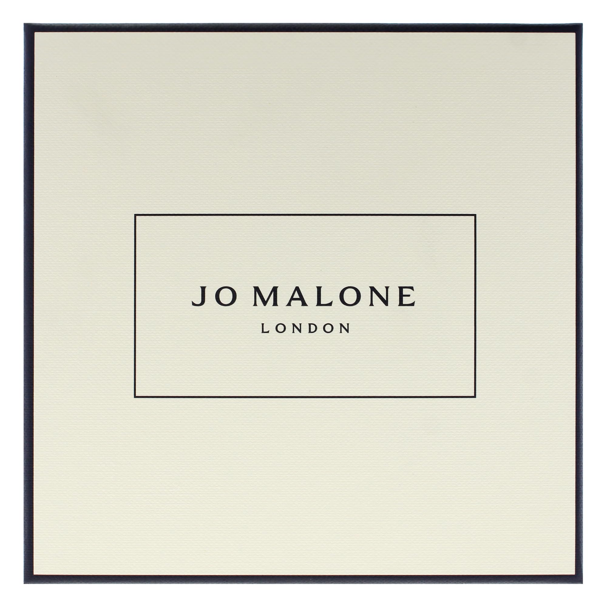 Jo Malone Wood Sage and Sea Salt apply hands demonstrates smooth application for daily skincare ritual.