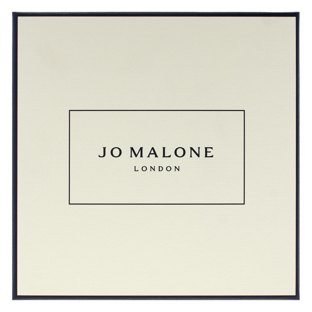 Jo Malone Wood Sage and Sea Salt apply hands demonstrates smooth application for daily skincare ritual.