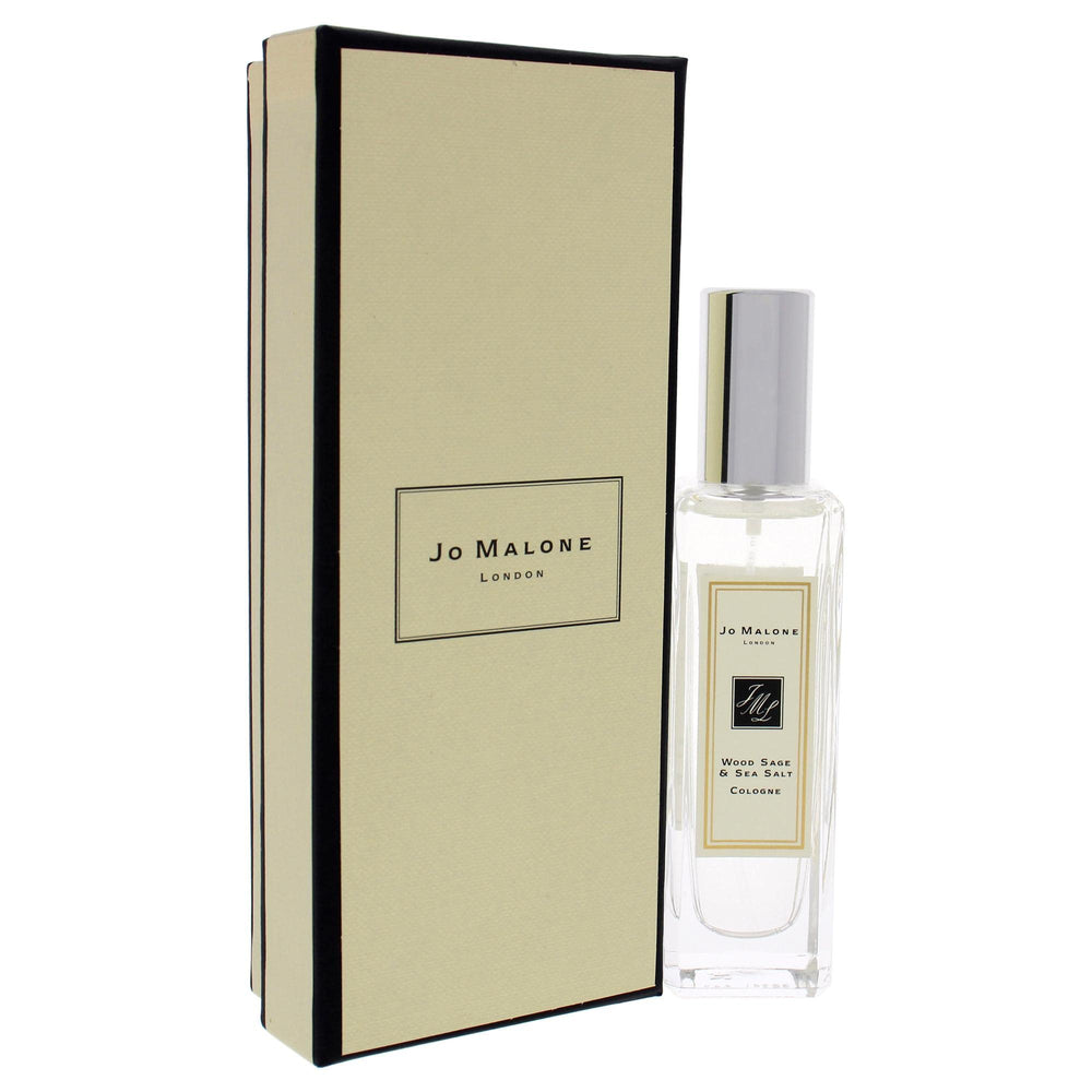 Jo Malone Wood Sage & Sea Salt spray bottle in use, effortless layering potential.