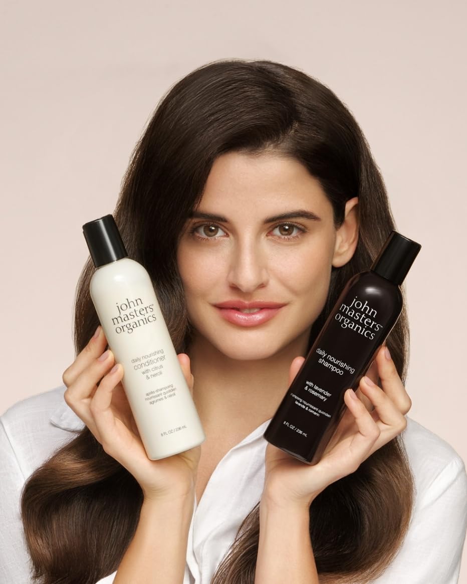 John Masters Organics Daily Nourishing Shampoo rosemary bottle stand conveys organic formula for healthy hair