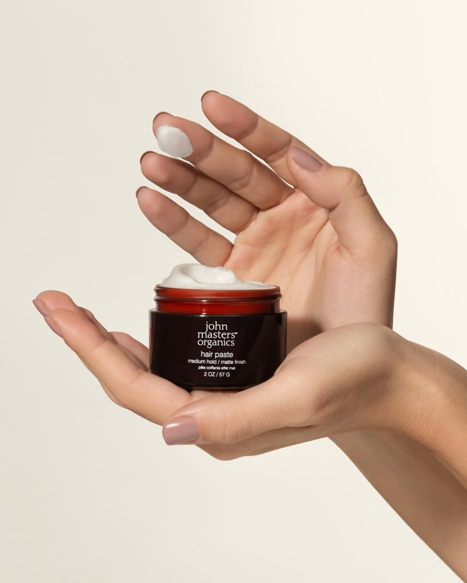 Styled hair with soft-matte finish using John Masters Organics hair paste.