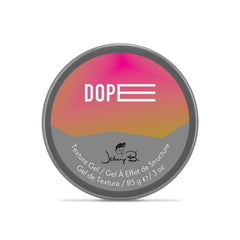 Johnny B Dope Texture Gel being scooped for easy styling control.