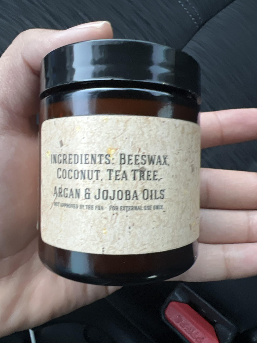 Johnny Slicks pomade on hair delivering strong hold with high shine finish.