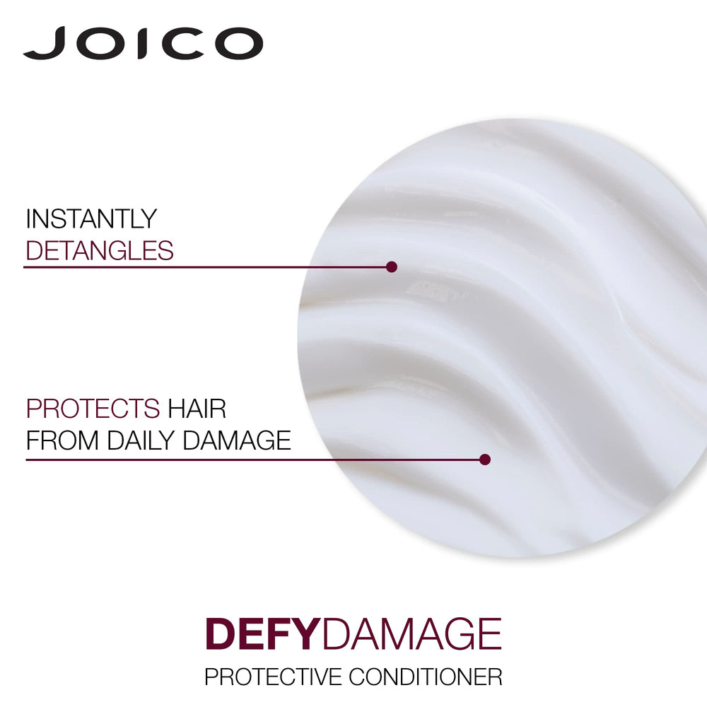 Joico Defy Damage shampoo-lather closeup—luxurious foam nurtures strands.