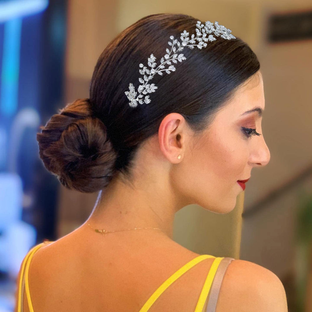Jorsnovs tiara wedding-hairstyle idea shows elegant styling