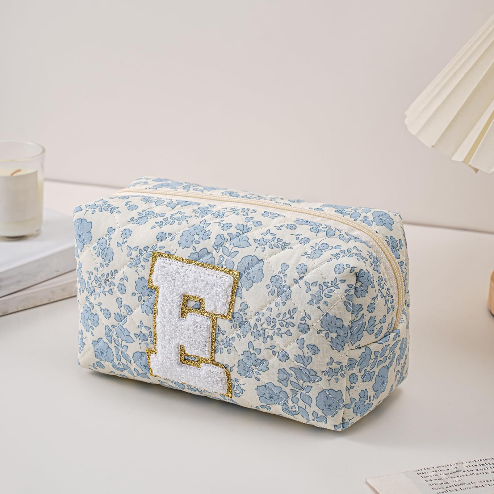 JOVAKIT alphabet makeup bag blue floral-e side shot showing spacious interior for cosmetics storage