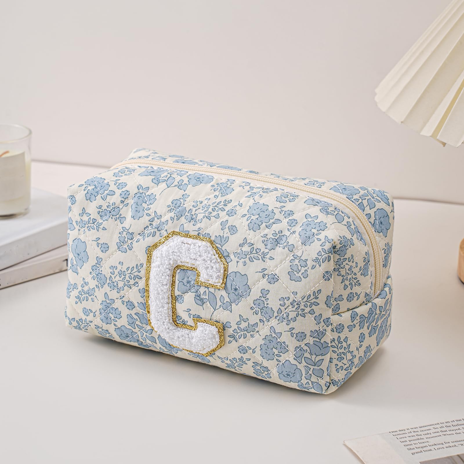 JOVAKIT Alphabet Makeup Bag blue floral side zip for easy access.