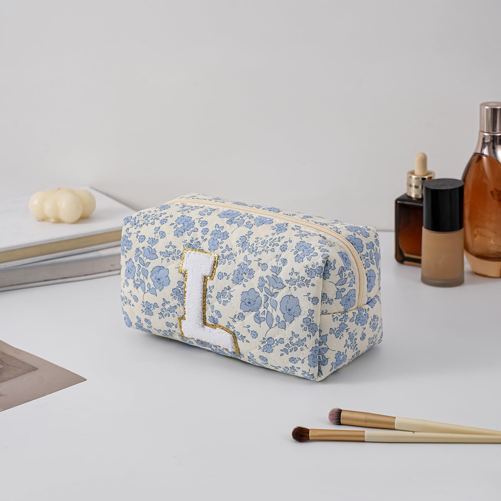 JOVAKIT Alphabet makeup bag blue floral side view showing slim profile for daily essentials