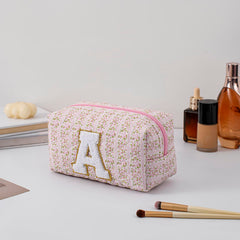 JOVAKIT alphabet makeup bag zipper detail emphasizing secure closure for travel