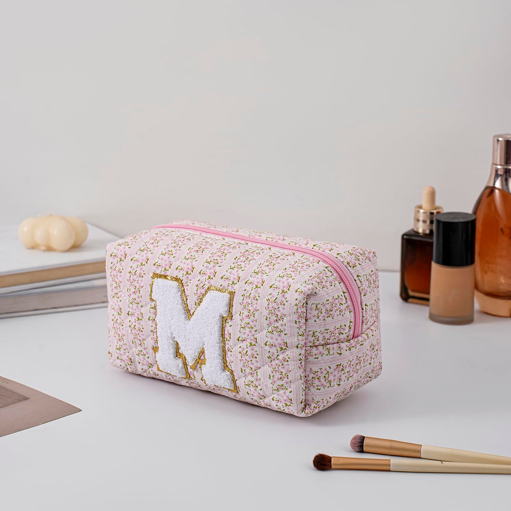 JOVAKIT pink floral travel pouch with zipper for cosmetics on the go.