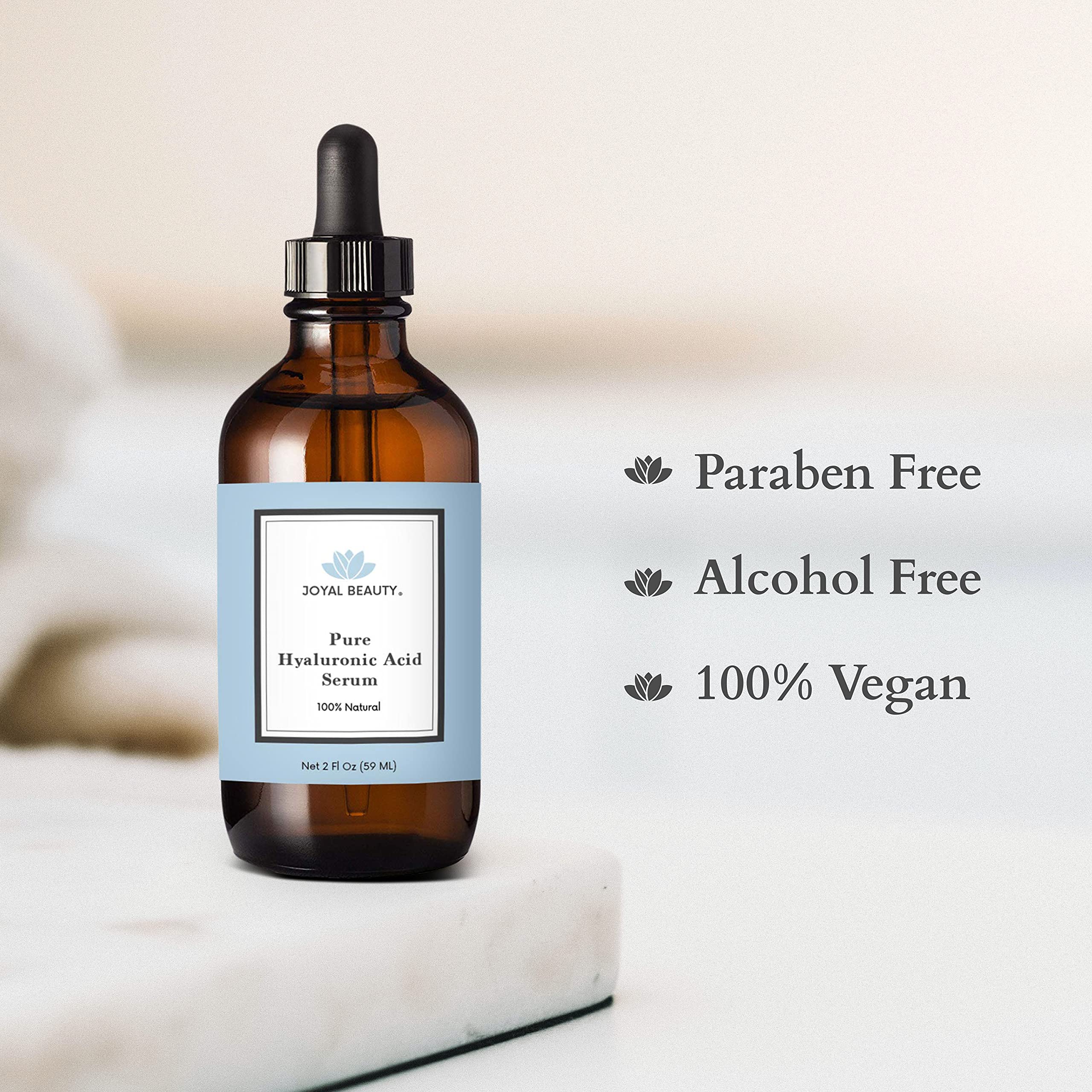 JOYAL BEAUTY alcohol-free vegan formula represented by leaves and clean design.