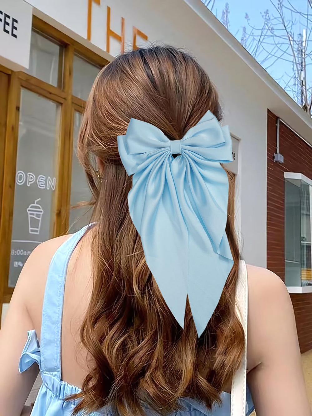 JOYOYO hair clip blue long bow on model showcases real-world styling.