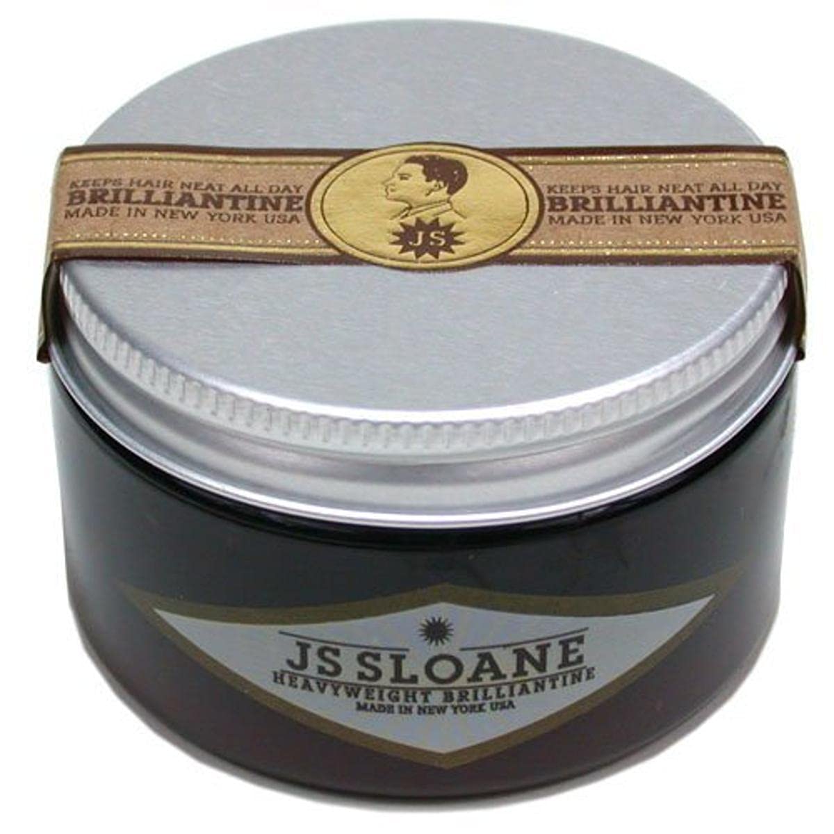 JS Sloane Heavy Weight Brilliantine pomade jar close-up for strong hold and glossy finish.