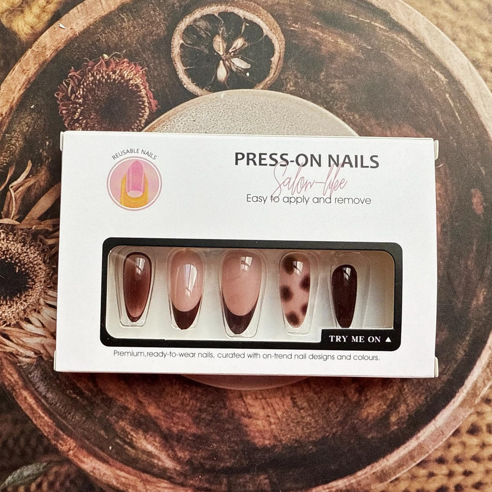 JUGGSSA almond press on nails leopard design for wedding or prom occasions.