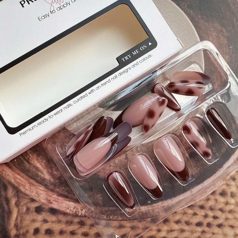 JUGGSSA almond press on nails includes nail file and wooden stick for shaping.