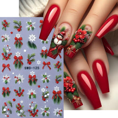 JUGGSSA snowman-santa-elk decals create playful 3D Christmas nail designs.