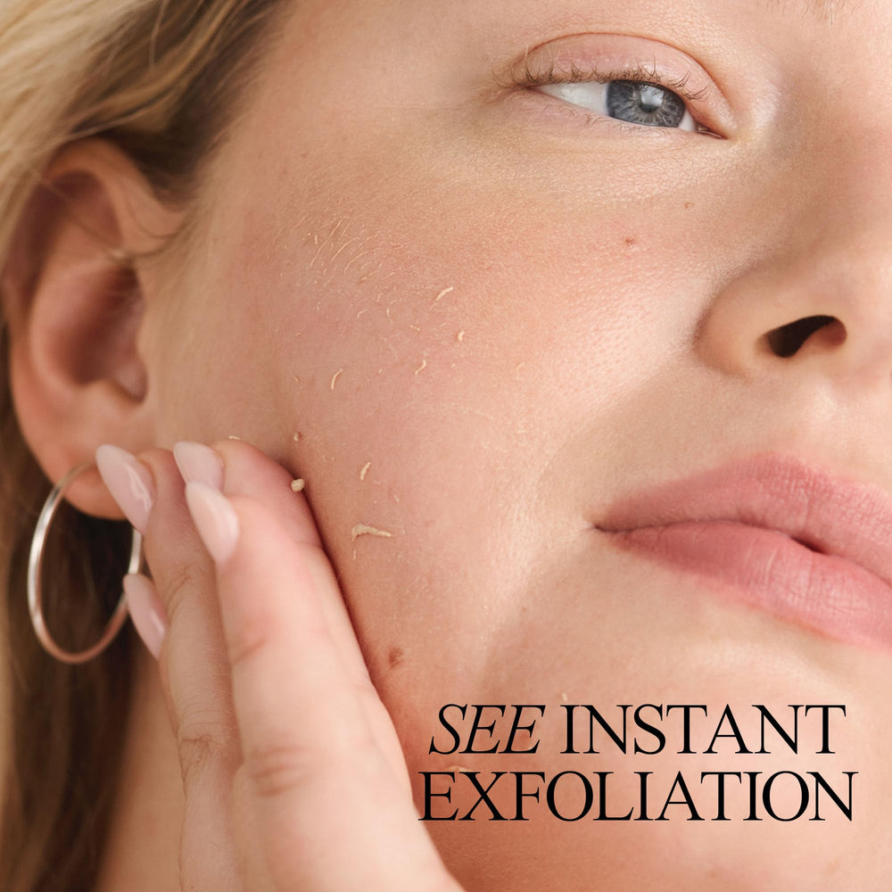 Juice Beauty Stem Cellular Exfoliating Peel Spray being applied with gentle circular massage to lift dead skin.
