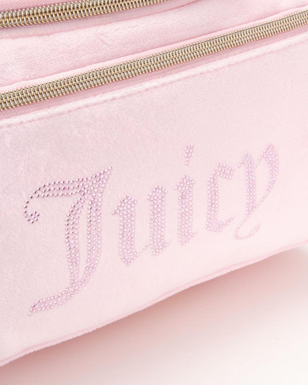 Juicy Couture pink makeup bag velour finish adds stylish travel charm.