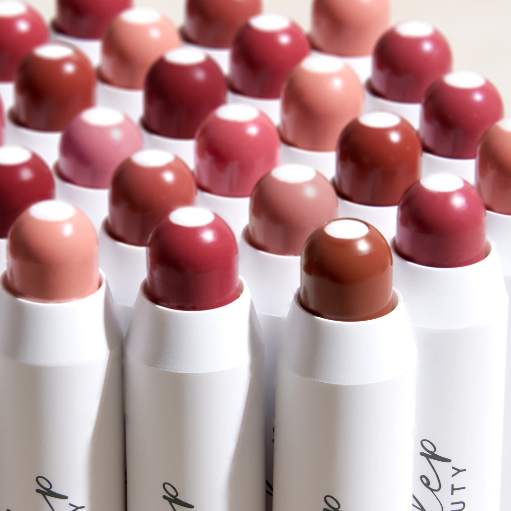 Julep It's Balm Tint on-the-go use demonstrates easy reapplication.