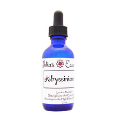 Julia's Essentials Abyssinian Oil bottle-pour for quick non-greasy hydration and shine