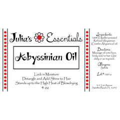 Julia's Essentials Abyssinian Oil hair-shine shows lustrous frizz-control finish