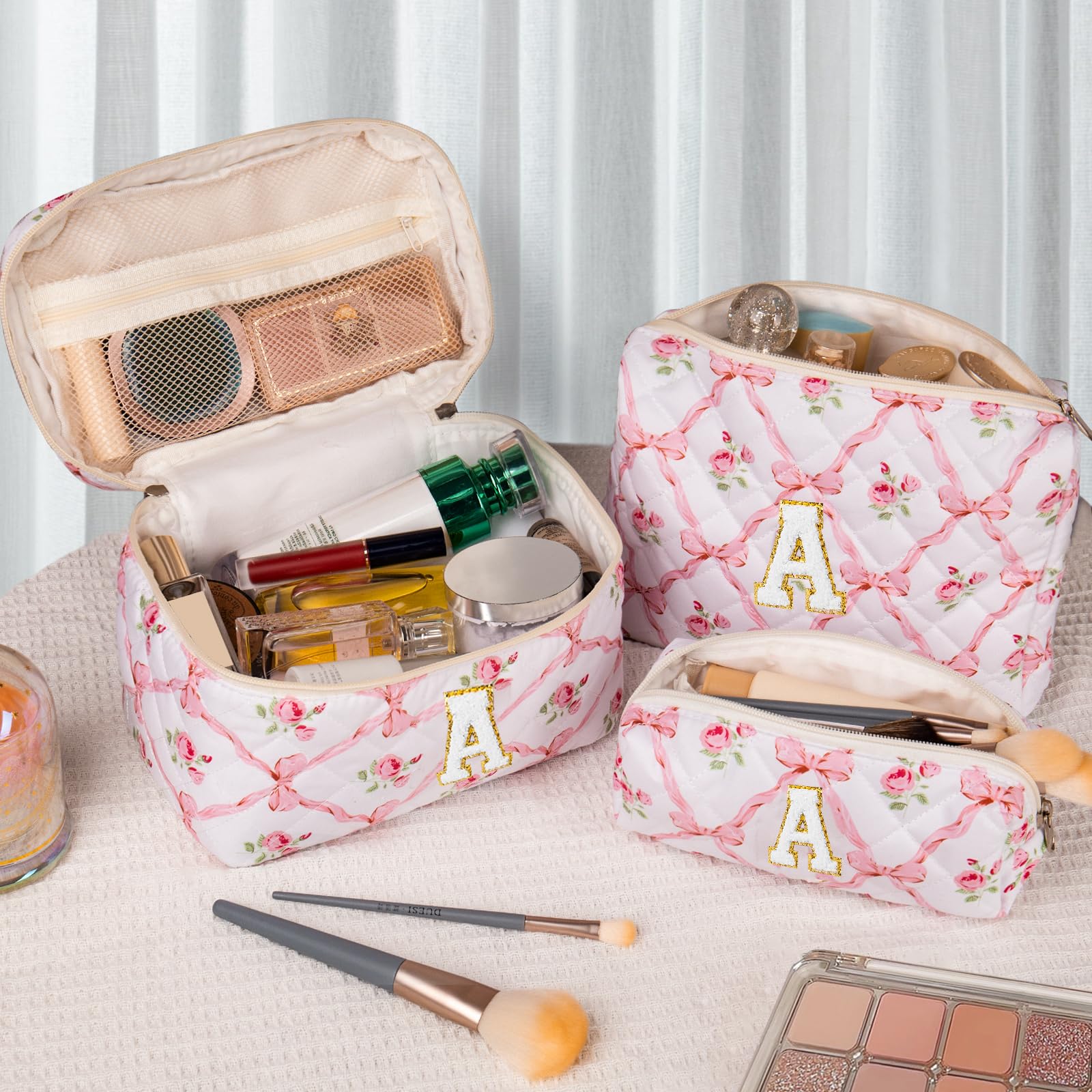 Junesters quilted floral bag interior pocket keeps brushes and items neatly organized.